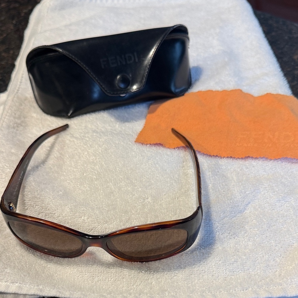 Pre-Owned, Gently Loved FENDI Sunglasses with Fendi case & Fendi cleaning cloth.